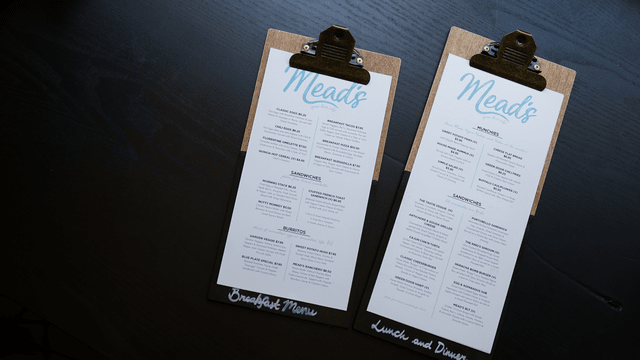 Image of two clipboards holding menus from Mead's
